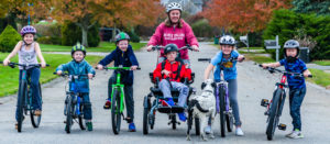 Van Raam Opair Wheechair Transport Bike witha group of kids