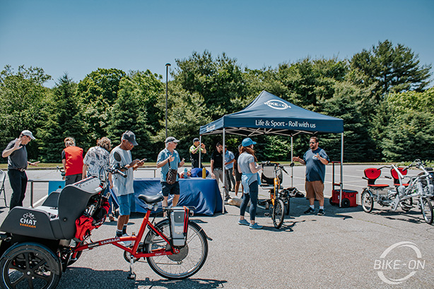 Bike-On's sales manager Kyle oversees a demo day at the Groton Expo, showcasing and explaining the adaptive cycle inventory to onlookers